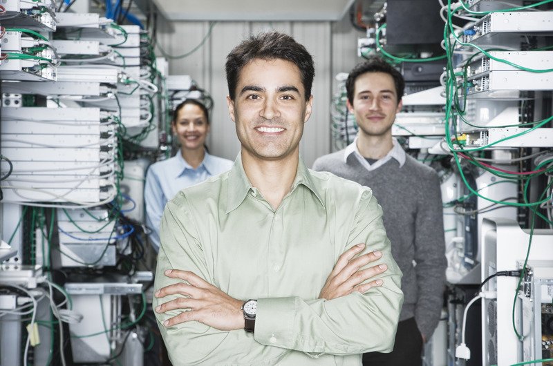 mixed-race-team-of-technicians-working-on-computer-2025-04-04-05-36-12-utc (1)